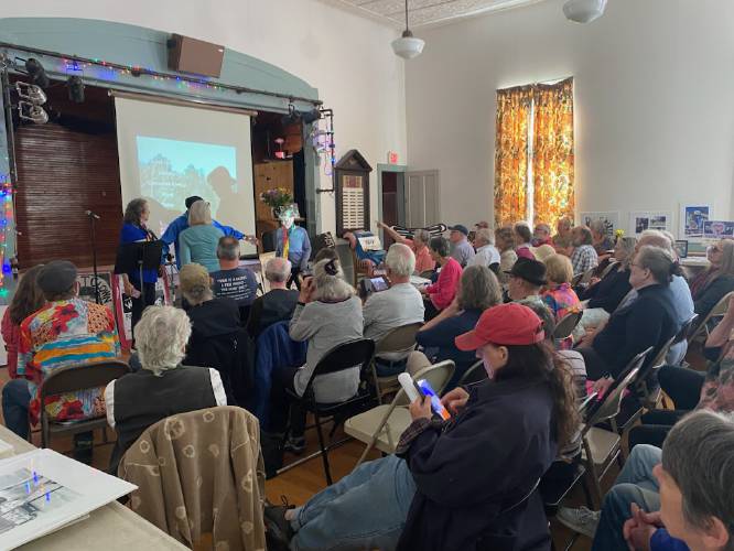 Joshua Jay Dostis, better known as the politically charged jester Waffles T. Clown, was remembered during a celebration of life at Wendell Town Hall on Saturday. Dostis died in November at the age of 83.