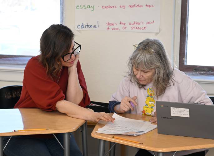 Instructor Jesse Pompei, left,  works with Turners Falls resident Tammy Baxter at The Literacy Project in Greenfield on Tuesday.