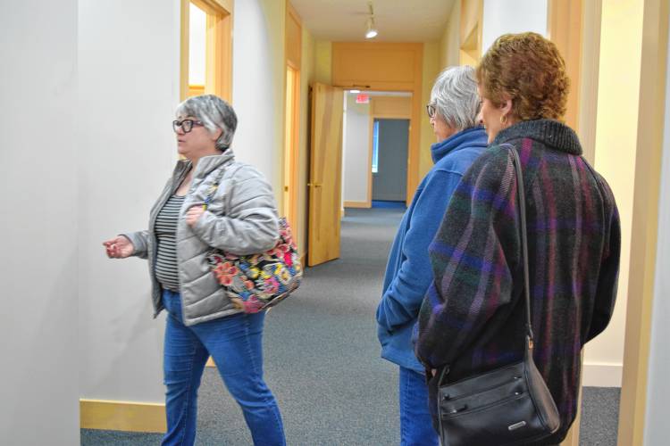 Jennifer Remillard, director of the South County Senior Center, showing the potential new senior center at 23 Plumtree Road.