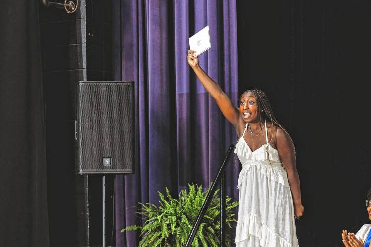 Yosola “Camille” Dawodu of Holyoke celebrates receiving her diploma during the 155th commencement exercises at Stoneleigh-Burnham School in Greenfield on Friday.
