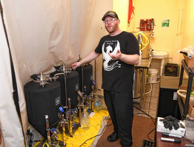Freedom Street Brewery owner Errin Woessner at his brewing operation in Erving.