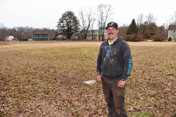 Robert A. Woodard stands near home plate at Spear Field in Orange, located west of Muzzey Field. He hopes to refurbish Spear Field for softball players.