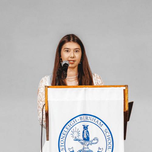 Stella Turowsky-Ganci of Shelburne Falls speaks during the 155th commencement exercises at Stoneleigh-Burnham School in Greenfield on Friday.