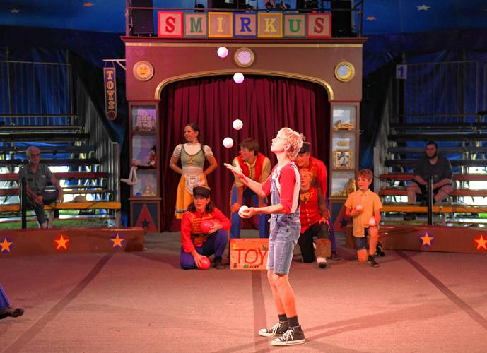 Oscar Gradick, 12, of Gill, juggles at a Circus Smirkus performance at the Franklin County Fairgrounds in Greenfield on Monday.