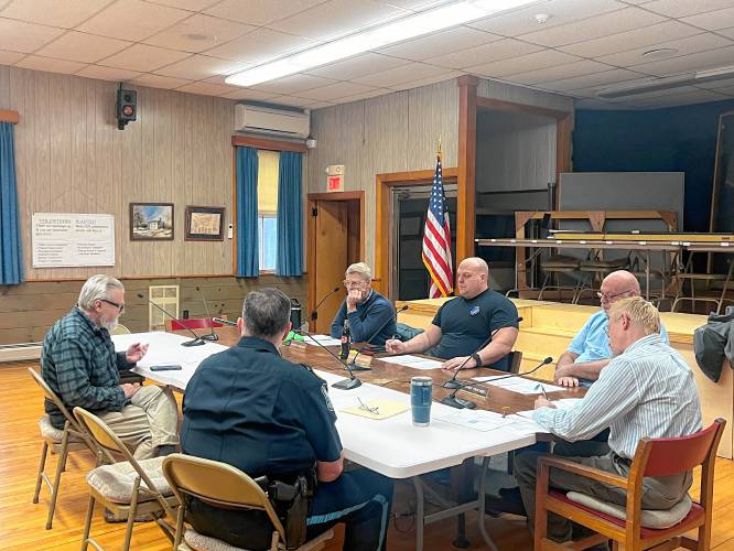 Members of the Gill Selectboard, Gill Police Chief Christopher Redmond and resident James Asbel discuss the town’s immigration sanctuary policy and immigration rights outreach to Gill residents during a Monday Selectboard meeting.