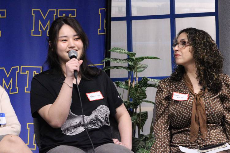 Norzin Wangmo, a senior at Mohawk Trail Regional School, speaks about her experience immigrating to America during a panel discussion last week that was held in conjunction with the “Voices and Votes: Democracy in America” Smithsonian exhibit.