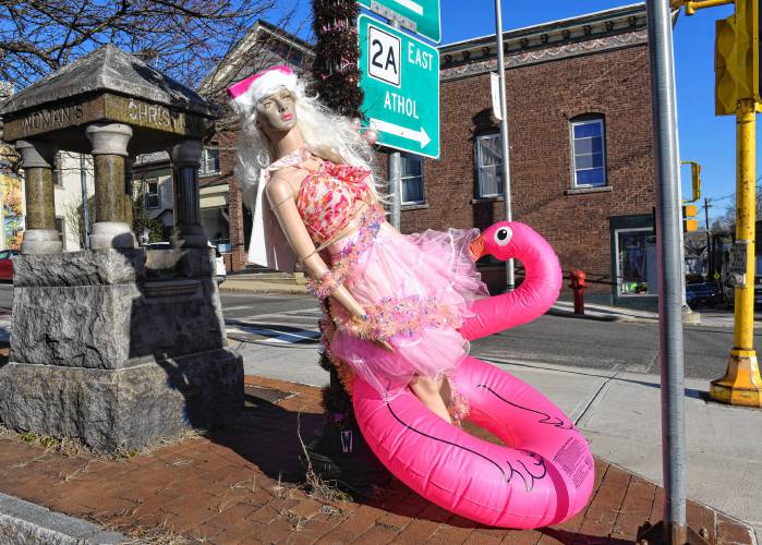 The winning lamppost in the Orange Merchants Group’s sixth annual lamppost-decorating contest was decorated by The Florist at Gelinas. The winning lamppost sported a Christmas hat-wearing Malibu Barbie and a pink pool floatie.