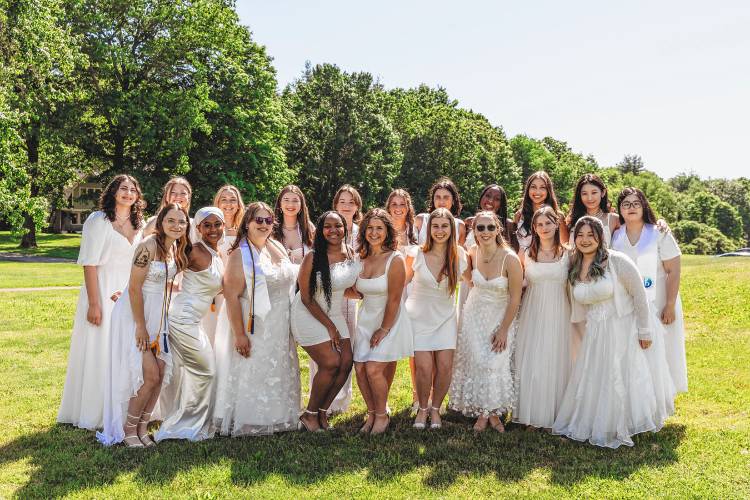 Wearing white dresses and big smiles, 20 young women graduated Friday at the 155th commencement exercises at Stoneleigh-Burnham School in Greenfield.