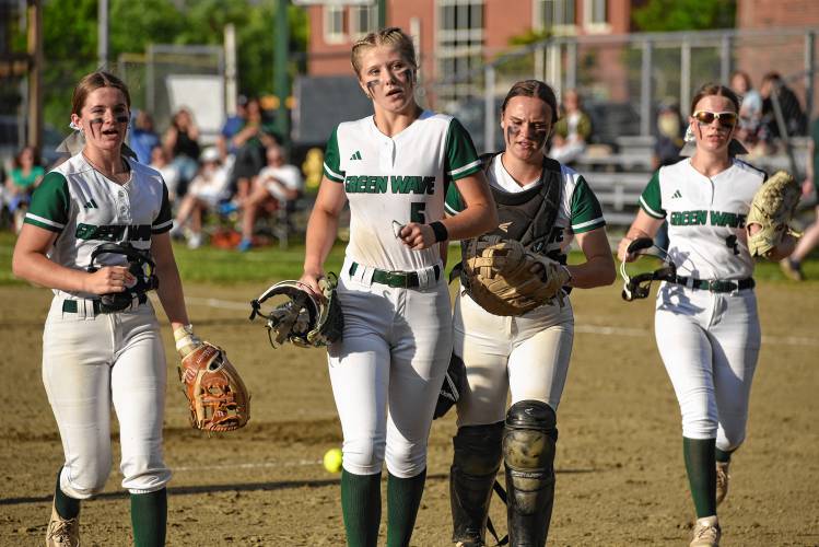 Greenfield softball players jog off the field in between innings during the team’s 5-2 loss to Tahanto in the MIAA Division 5 quarterfinal round on Friday at Vets Field.