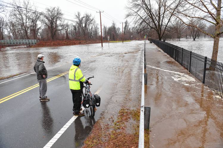 The Green River floods at Nash’s Mill Road in Greenfield in December, with the water flooding the parking lots, fields and buildings.