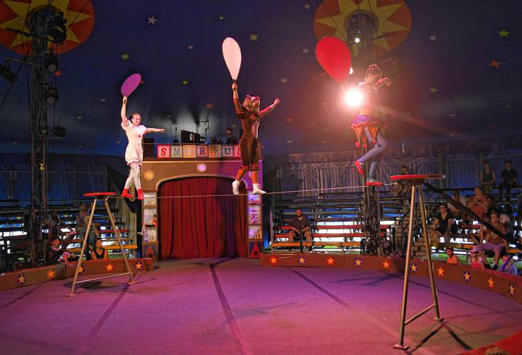 Aerialists perform on a tight wire at a Circus Smirkus performance at the Franklin County Fairgrounds in Greenfield on Monday. 