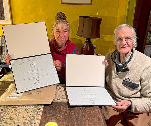 Katja Esser and Larry Buell show the President’s Volunteer Service Award they received for their many years of work in Petersham and the surrounding communities. Katja Esser and Larry Buell show the President’s Volunteer Service Award they received for their many years of work in Petersham and the surrounding communities.