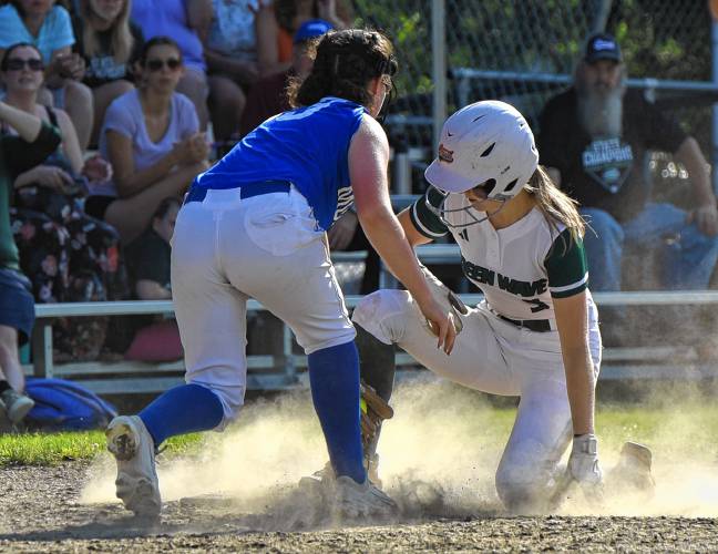 Greenfield’s MacKenzie Paulin (5) is safe at third base against Monson during the Green Wave’s victory in the MIAA Division 5 Round of 16 on Wednesday at Veterans Field in Greenfield.