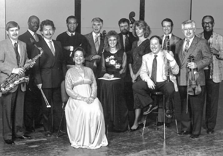 UMass music faculty circa late 1980s, standing (from left): Lynn Klock, Horace Clarence Boyer, William Hanley, Max Roach, Leopold (Terry) Teraspulsky, Salvatore Macchia, Estela Olevsky, Jon Humphrey, Charles Treger, Frederick Tillis. Seated (from left): Paulina Stark, Nadine Shank, Michael Sussman.