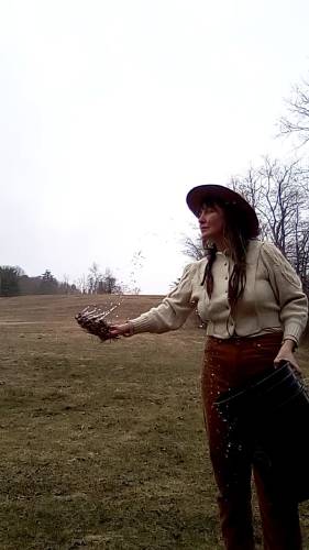Elisha Poulin demonstrates the application of biodynamic preparations concocted to add health and vitality to the soil. The Shelburne resident enjoys sharing the work of Rudolf Steiner, who in the 1920s put forth bold ideas about bolstering soil vitality after farmers approached him for help; the farmers found that the popular introduction of chemical applications led to the depletion of soil, plant, and animal health.