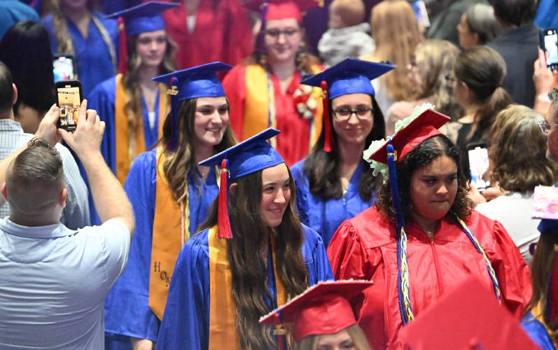 Seniors file into commencement exercises at Ralph C. Mahar Regional School Friday evening.