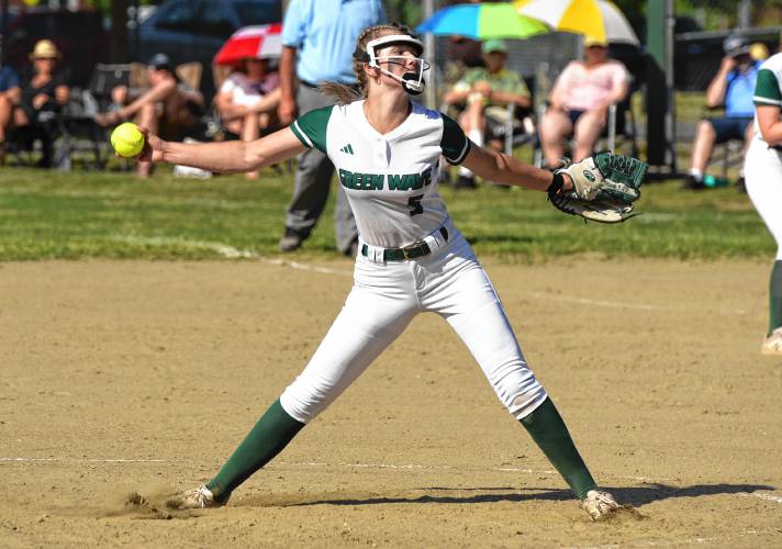 Greenfield’s MacKenzie Paulin (5) delivers a pitch against Monson during the Green Wave’s victory in the MIAA Division 5 Round of 16 on Wednesday at Veterans Field in Greenfield.