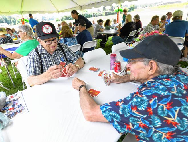 Conway resident Donat Charest and South Deerfield resident Gary Beaudry play pitch at the South County Senior Center’s annual picnic at Herlihy Park in Whately on Wednesday.