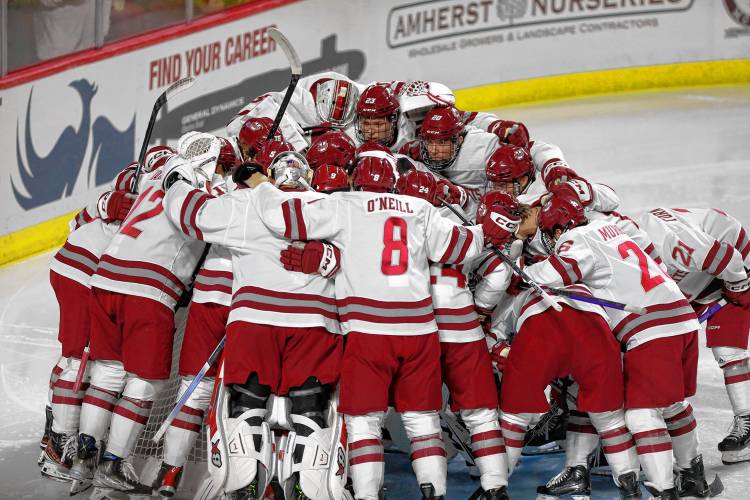 UMass players huddle up prior to their season opener against AIC at the Mullins Center in Amherst. UMass players huddle up prior to their season opener against AIC at the Mullins Center in Amherst.