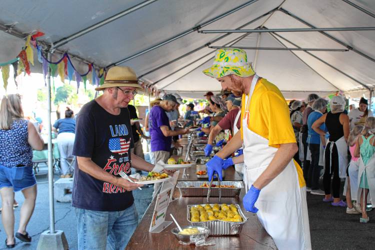 Stone Soup Café’s annual Harvest Supper drew hundreds of people to Court Square in Greenfield on Saturday.
