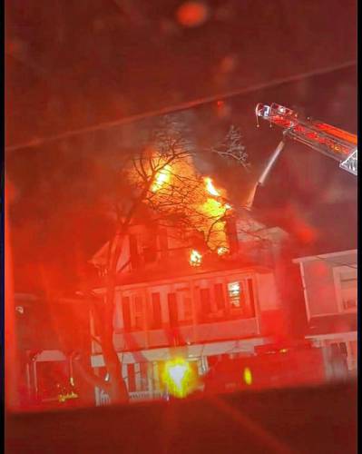 Crews from multiple departments battled a fire on the third floor of a residential building on G Street late Sunday evening.