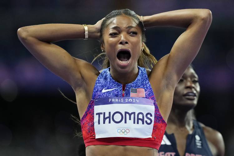 Florence’s Gabby Thomas reacts after winning the women’s 200-meters  final at the 2024 Summer Olympics on Tuesday in Saint-Denis, France.