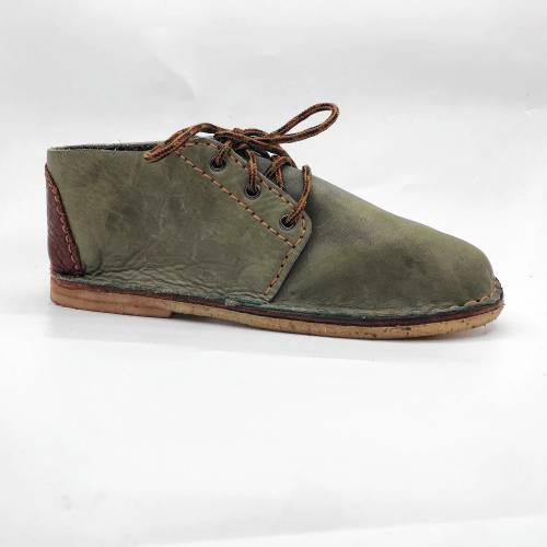 Sharon Raymond, whose motto is “a step in the right direction,” teaches people to make their own simple shoes. Raymond suggests adding arch supports or inserts, if needed, rather than expecting industry-produced shoes with built-in supports to work well for everyone.