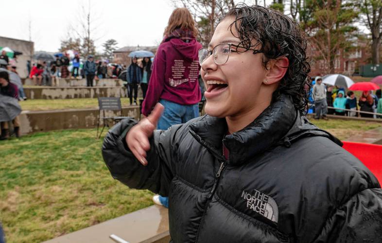 Zoey Mordecai, an Amherst Regional High School student, during a protest outside the UMass Campus Center before a hearing of the Joint Committee on Ways and Means on Monday.