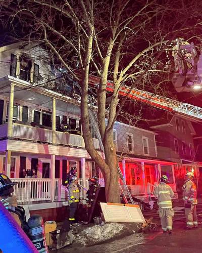 A three-alarm fire displaced the families living in this three-story home on G Street. No injuries were reported.