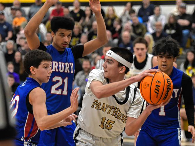 Pioneer’s Alex McClelland (15) is surrounded by a trio of Drury defenders during the Panthers’ 54-44 victory in the MIAA Division 5 quarterfinal round on Saturday at Messer Gymnasium in Northfield.