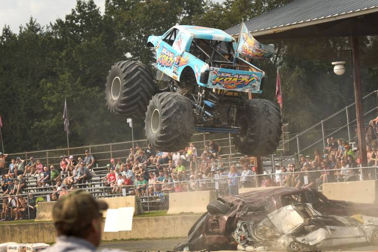 Plane Krazy takes off over a pile of crushed cars at the Overdrive Monster Truck Show at the Franklin County Fair in 2023. Another monster truck show will be held at the fairgrounds on Saturday, June 29, having received approval from the Greenfield Board of License Commissioners on Tuesday.