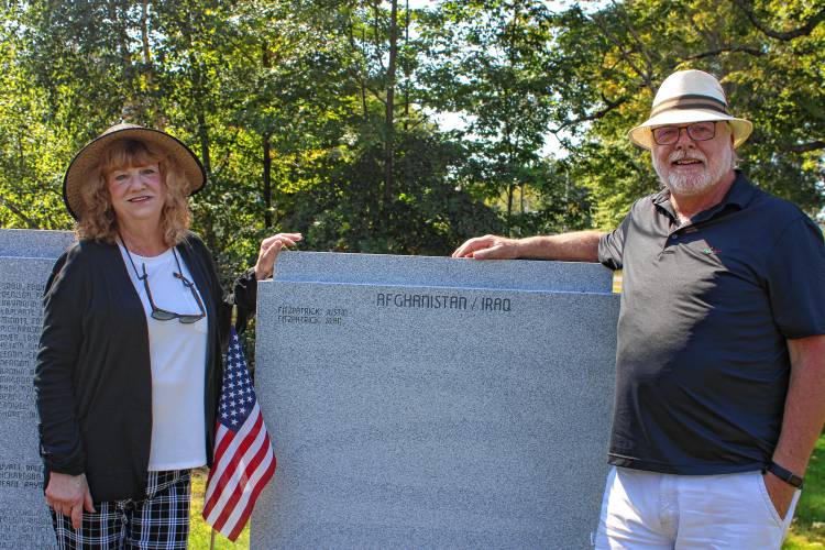 Karen (left) and Mark Fitzpatrick at the newly added Afghanistan and Iraq War stone memorial. Their sons, Justin and Sean Fitzpatrick, are the first names to be added to the memorial for veterans who served following the memorial’s first dedication in 2002.