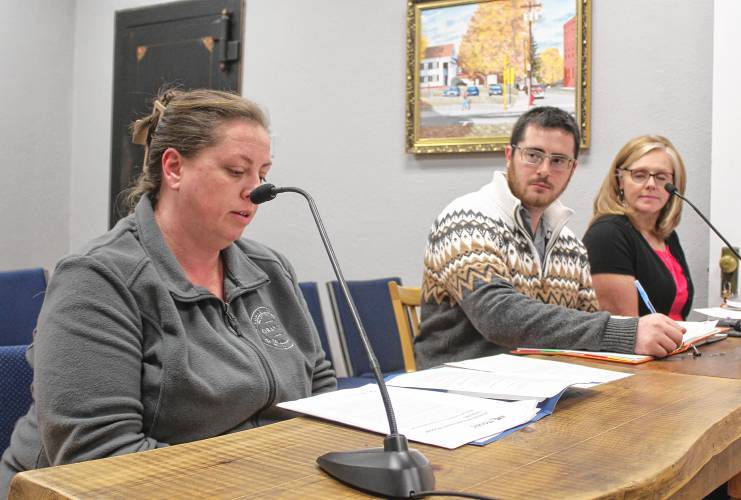 Ashley Gough, Orange’s health agent, speaks to the Selectboard during Wednesday’s meeting. To her left are Town Administrator Matthew Fortier and Brianne Bruso, Fortier’s administrative assistant. Ashley Gough, Orange’s health agent, speaks to the Selectboard during Wednesday’s meeting. To her left are Town Administrator Matthew Fortier and Brianne Bruso, Fortier’s administrative assistant.