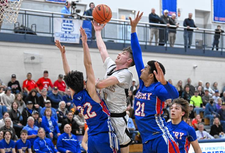 Pioneer’s Brayden Thayer goes up for two against Drury during the Panthers’ 49-23 win in the MIAA Division 5 semifinals at West Springfield High School Tuesday night.
