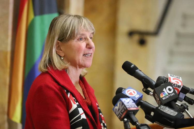 Senate President Karen Spilka stands in front of a Pride Flag at an event celebrating Trans Day of Visibility at the State House on March 31. Senate President Karen Spilka stands in front of a Pride Flag at an event celebrating Trans Day of Visibility at the State House on March 31.