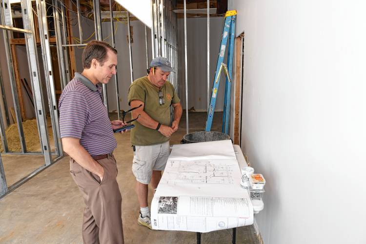 Children’s Advocacy Center Executive Director Jeffrey Trant talks with Paul Savoie of Thayer Street Builders at a new location for the center in the 119 New Athol Road plaza in Orange. The roughly 800-square-foot space, expected to be ready by early November, will house an outpatient clinic providing specialized mental health services for child victims of sexual abuse and their families.