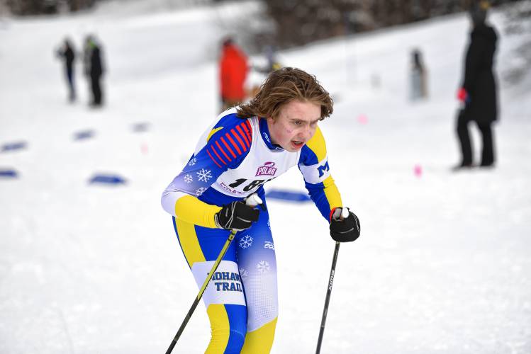 Mohawk Trail’s Malcolm Todd (186) heads for the finish line during the MIAA Nordic Ski Championships at Prospect Mountain in Woodford, Vt.