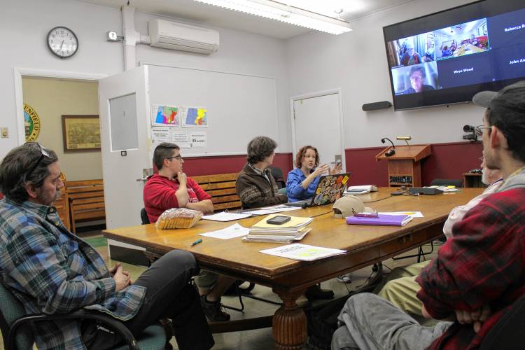 Greenfield Historical Commission members meet with city officials and Connecticut River Conservancy officials on Thursday to discuss removal of the Wiley-Russell Dam.