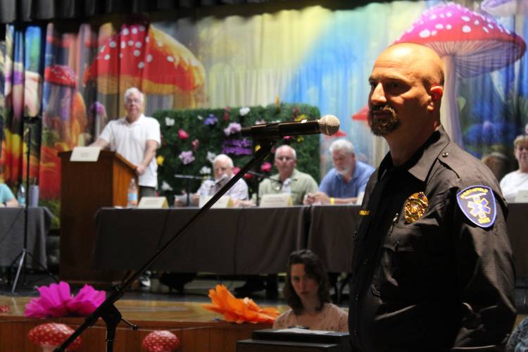 Northfield EMS Chief Matthew Wolkenbreit speaks at Bernardston's annual Town Meeting Saturday morning at Pioneer Valley Regional School.