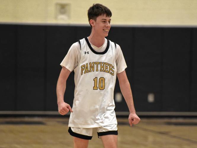 Pioneer’s Brayden Thayer (10) celebrates against Drury during the Panthers’ 54-44 victory in the MIAA Division 5 quarterfinal round on Saturday at Messer Gymnasium in Northfield.
