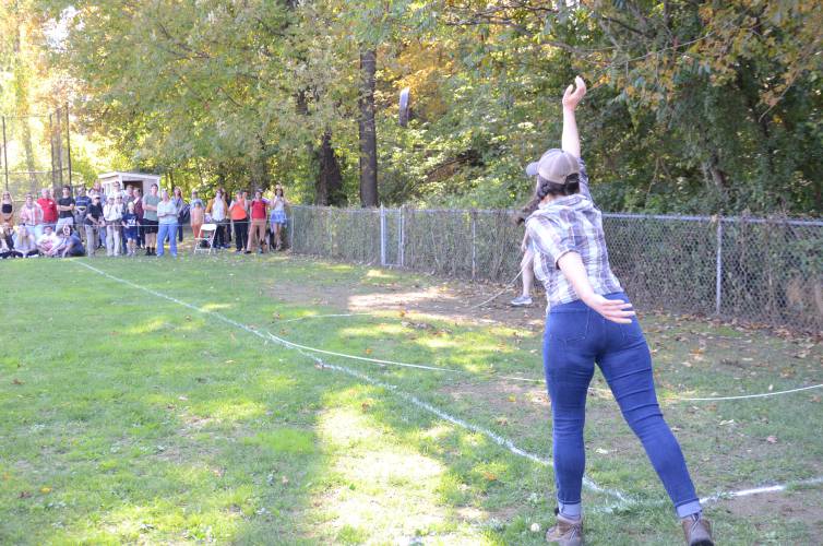 Greenfield resident Renn Smith, who won the women’s division, tosses a cast iron skillet during Conway’s 59th Festival of the Hills in October 2023.