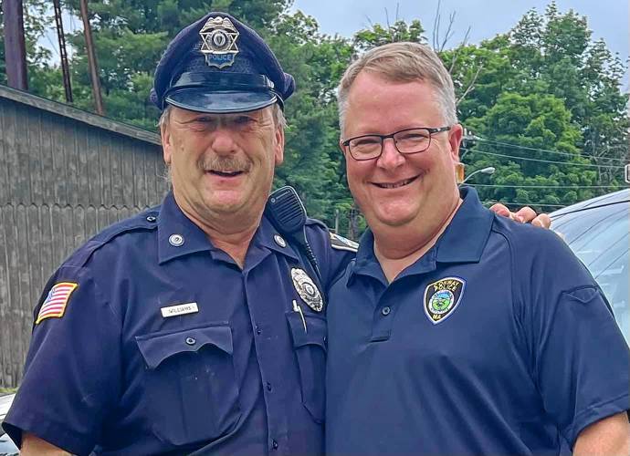 Randall Williams, at left, has retired after 28 years of service to the Conway Police Department. He is pictured with Conway Police Chief Donald Bates.