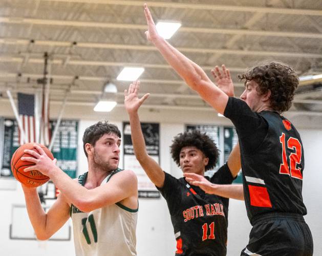 Greenfield's Jon Breoz (11) looks to pass the ball during the high school basketball game against South Hadley at Greenfield High School, Wednesday, Feb. 5, 2025, in Greenfield.