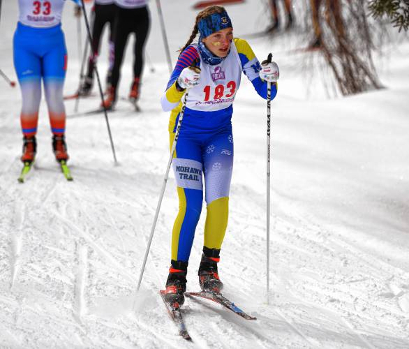 Mohawk Trail’s Corinne Somes (183) maneuvers through the course during the MIAA Nordic Ski Championships at Prospect Mountain in Woodford, Vt.