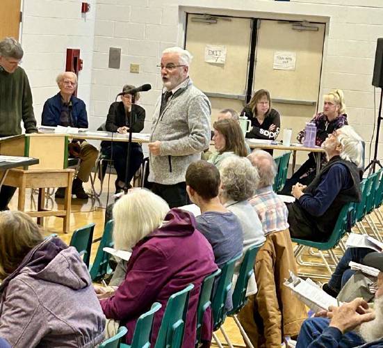 Franklin County Technical School Superintendent Rick Martin speaks during Heath's Annual Town Meeting on Saturday.