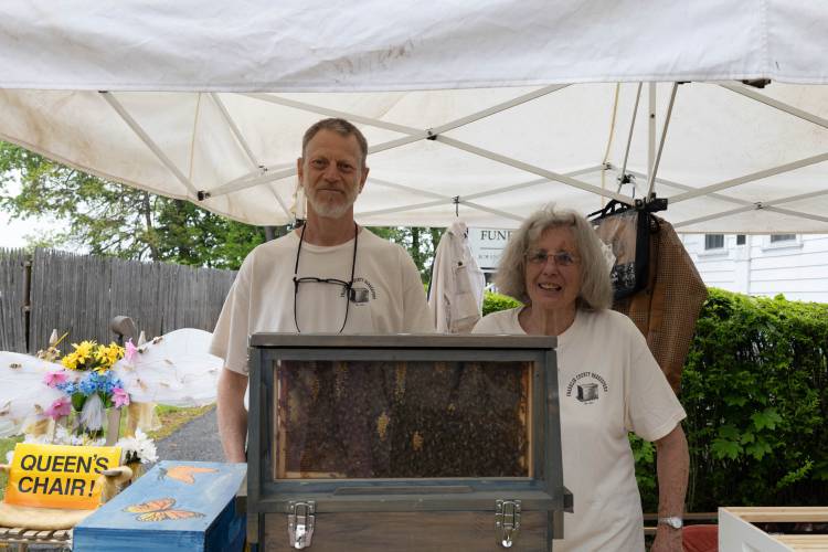 Franklin County beekeepers Bryan Cady and Connie Clark table at the annual Greenfield Bee Fest.