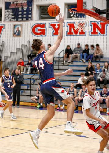 Frontier’s Owen Babb (14) puts in a breakaway layup against Athol earlier this season at Goodnow Gymnasium in South Deerfield. Frontier’s Owen Babb (14) puts in a breakaway layup against Athol earlier this season at Goodnow Gymnasium in South Deerfield.
