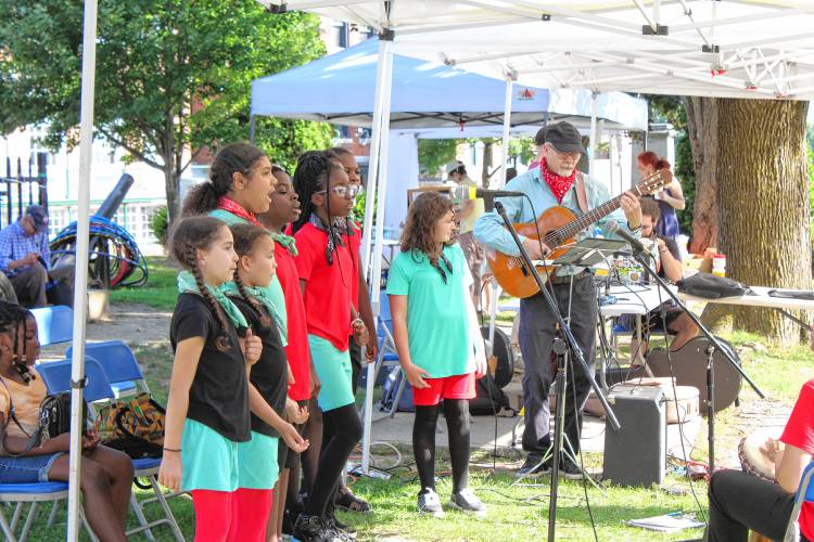 The Twice As Smart Choir directed by Gloria Matlock at the Harvest Supper at Court Square.