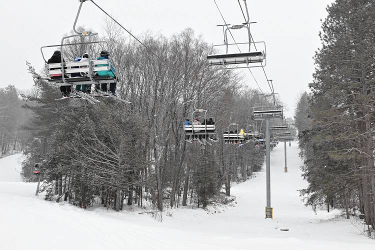 Skiers head up the mountain at Berkshire East Mountain Resort in Charlemont on Thursday.