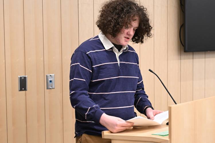 Henry Maxey reads his poem that was a finalist in the Youth 15-18 category of the Poet’s Seat Poetry Contest during the awards ceremony at the Greenfield Public Library on Tuesday evening.